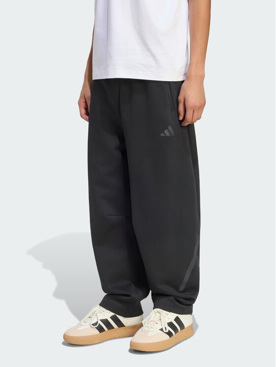 adidas adidas Spodnie materiałowe Z.N.E. OPEN HEMZ.N.E. OPEN HEM Czarny Loose Fit