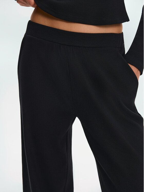 Nudyess Nudyess Spodnie materiałowe Canvas z prążka Czarny Relaxed Fit