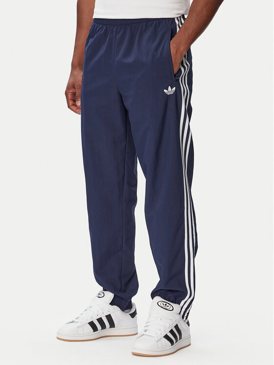 adidas adidas Sporta bikses Firebird Woven KE1370 Tumši zils Regular Fit