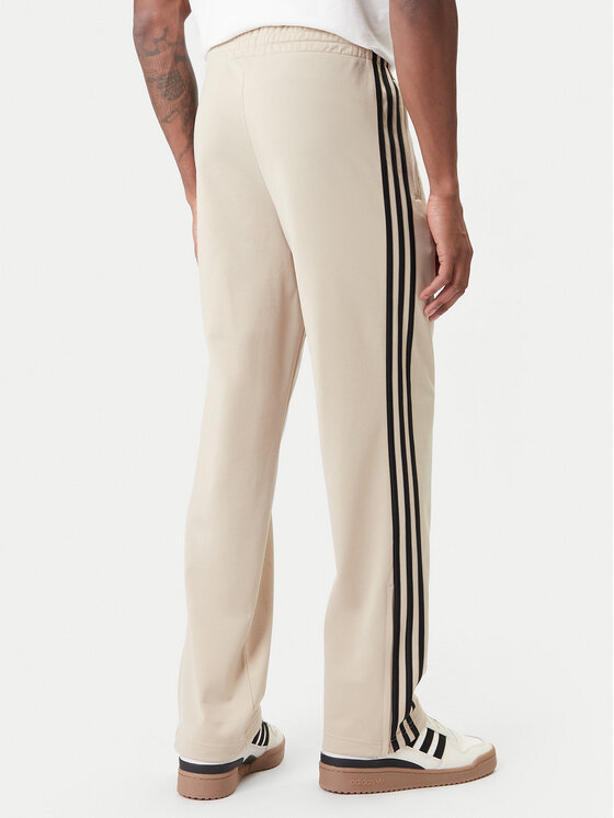 adidas adidas Долнище анцуг Firebird KE6679 Бежов Loose Fit