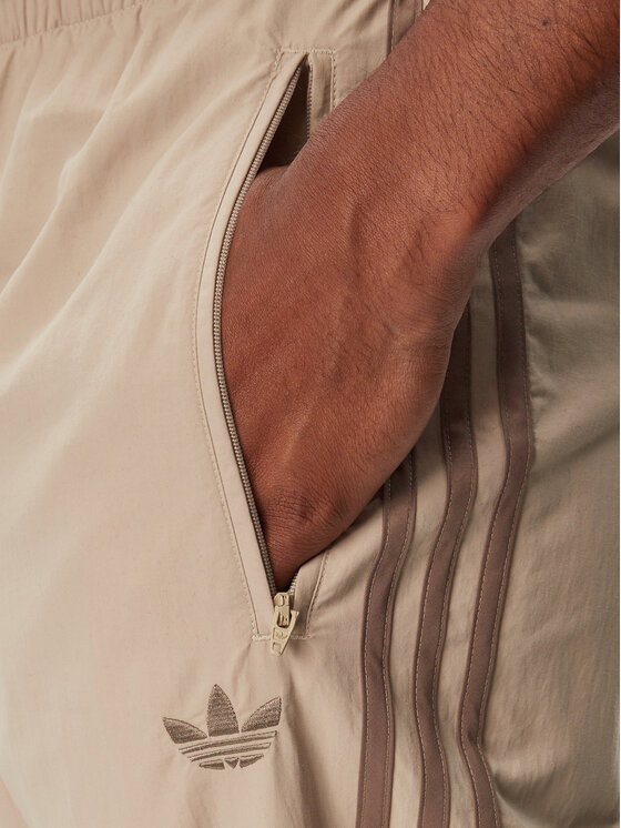 adidas adidas Долнище анцуг Firebird KS7503 Бежов Regular Fit