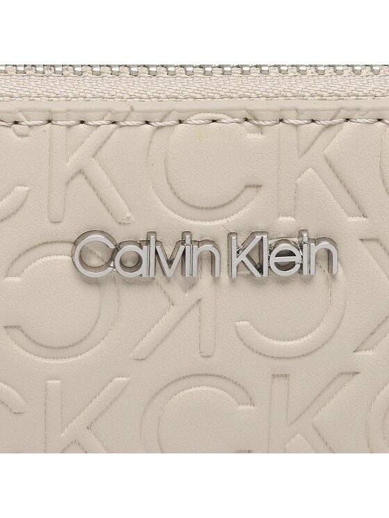 Calvin Klein Calvin Klein Soma Ck Must Camera Bag W/Pckt Emb Mn K60K611008 Bēšs