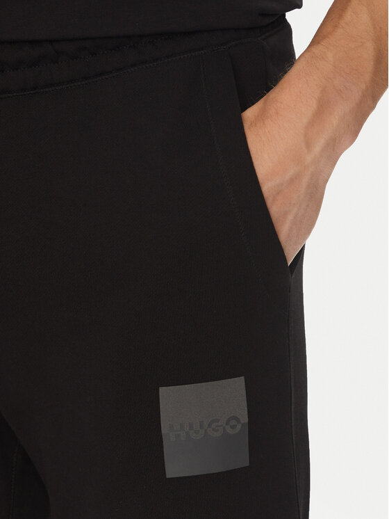 HUGO HUGO Pantaloni da tuta Dusplitan 50542866 Nero Relaxed Fit