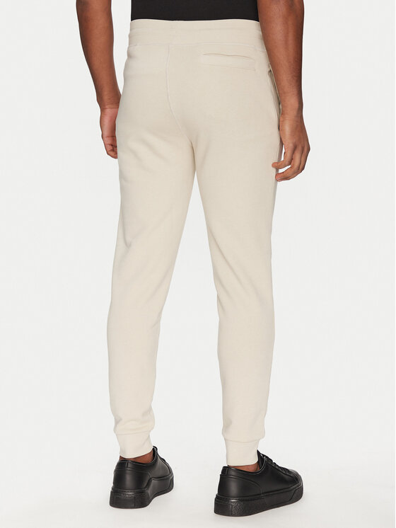 Guess Guess Spodnie dresowe 2YB22 KAIJ1 Écru Regular Fit
