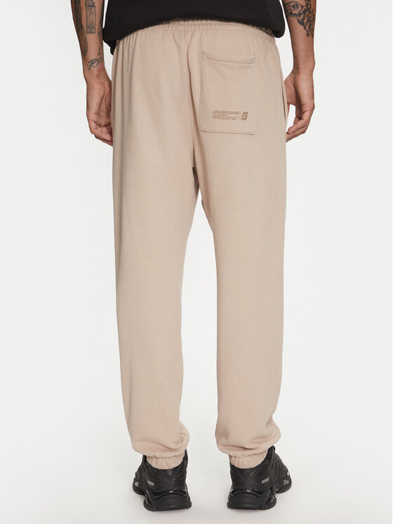 Guess Guess Pantaloni da tuta Emis Z4YB00 KAIJ1 Beige Relaxed Fit