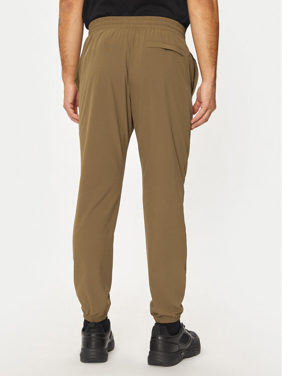 Under Armour Under Armour Donji dio trenerke UA Vibe Woven 1386557 Smeđa Regular Fit