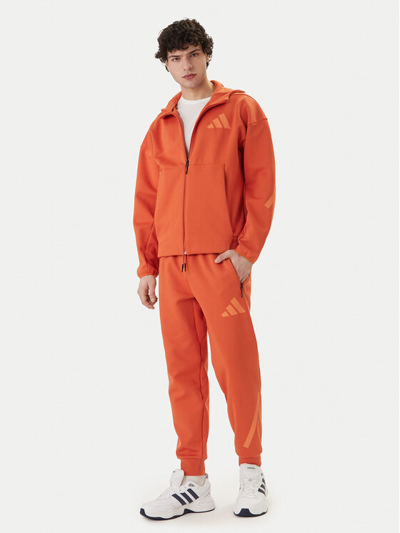 adidas adidas Spodnji del trenirke Z.N.E. KE4686 Oranžna Regular Fit