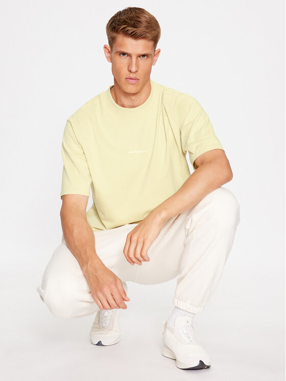 New Balance New Balance T-Shirt Athletics Linear T-Shirt MT33560 Brązowy Regular Fit