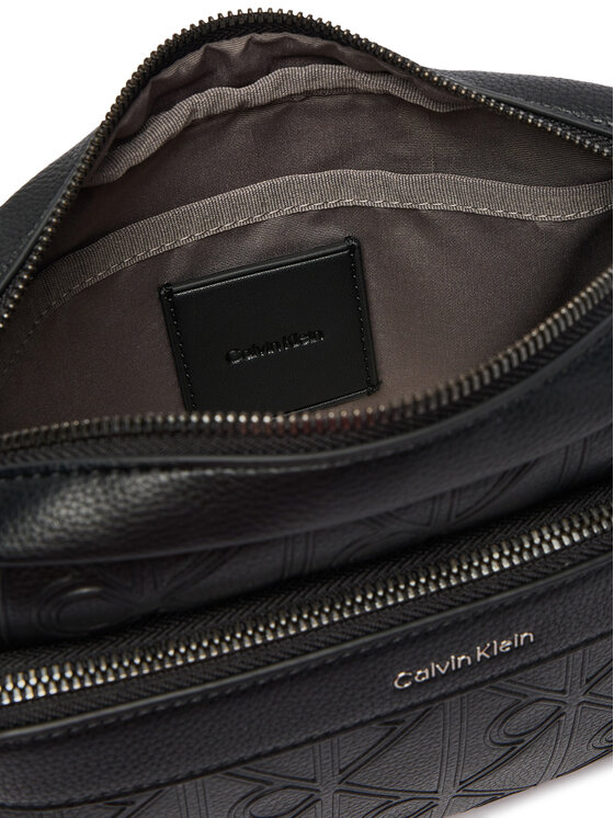 Calvin Klein Calvin Klein Torbica za okrog pasu Emblem Aop Deboss Camera Bag LV04D3563G Črna