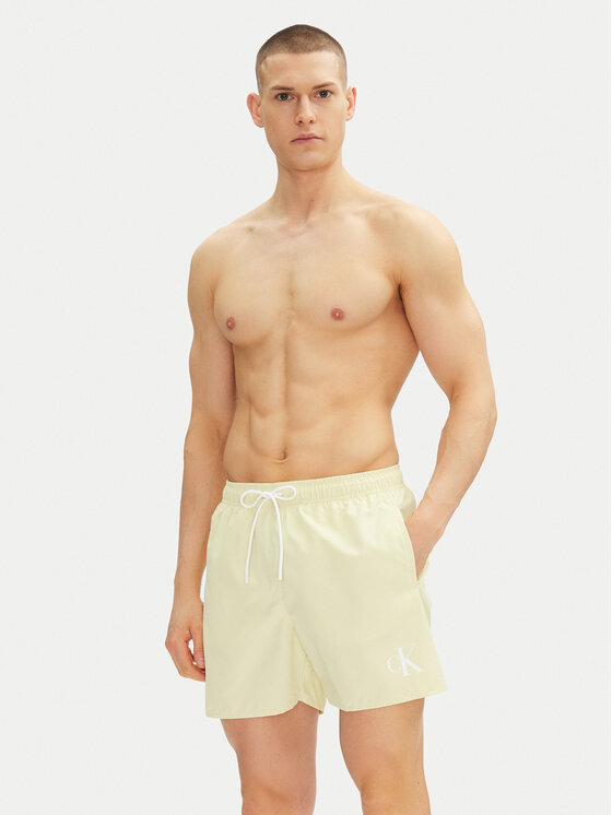 Calvin Klein Swimwear Calvin Klein Swimwear Kupaće gaće i hlače KM0KM01101 Žuta Regular Fit