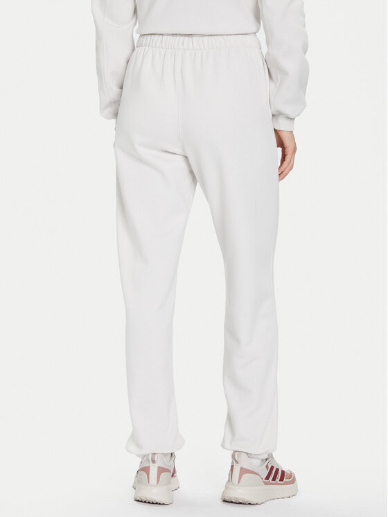 Under Armour Under Armour Spodnie dresowe Ua Icon 6003676 Écru Loose Fit