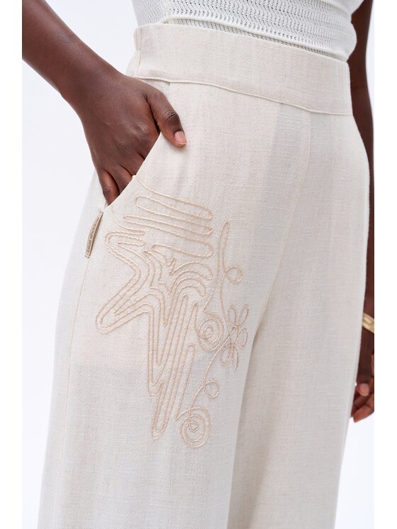 blue shadow blue shadow Spodnie damskie Musaka Écru Regular Fit