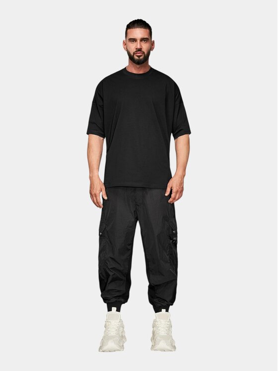 MADE BY SOCIETY MADE BY SOCIETY Spodnie materiałowe BLOCK DROP - P17791 Czarny Basic Fit