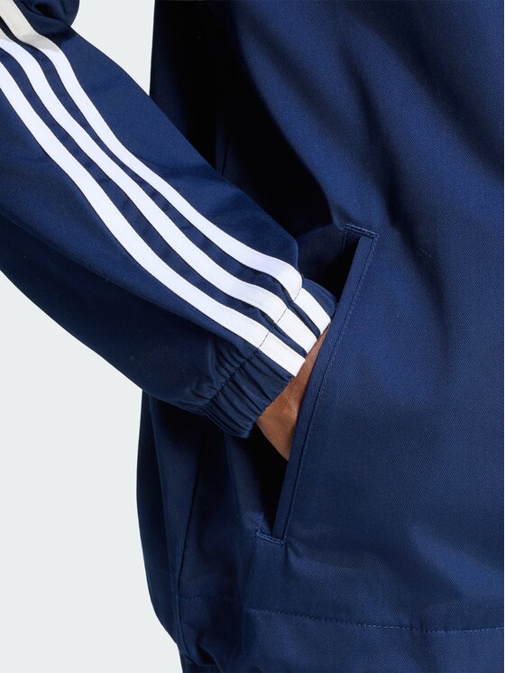 adidas adidas Giacca di transizione 3 Stripes Coaches Jacket KE4174 Blu scuro Regular Fit
