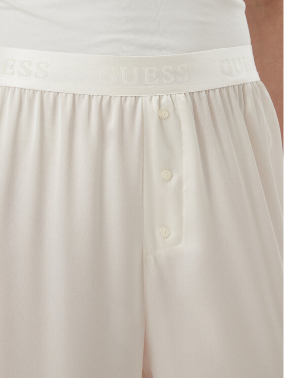 Guess Guess Spodnie piżamowe O6BB05 W3511 Kremowy Regular Fit