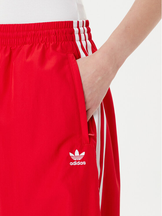 adidas adidas Долнище анцуг adicolor Firebird JD3388 Червен Loose Fit