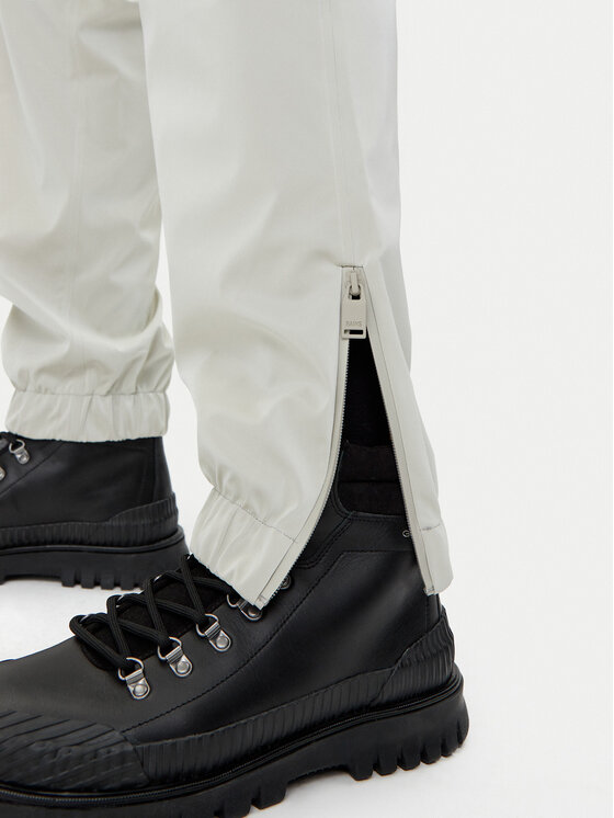 Rains Rains Spodnie przeciwdeszczowe Unisex 18560 Beżowy Regular Fit