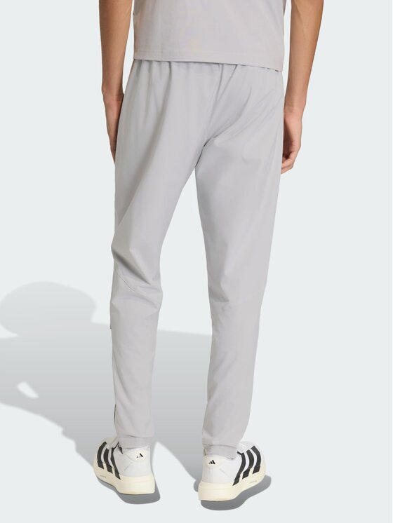 adidas adidas Spodnie materiałowe Algeria Tiro Szary Regular Fit