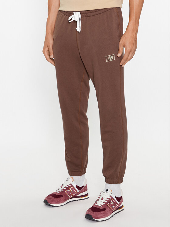 New Balance Spodnji Del Trenirke NB Essentials Sweatpant MP33509 Rjava Regular Fit