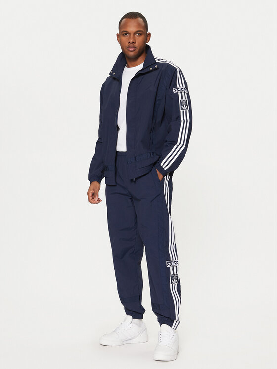 adidas adidas Spodnji del trenirke Adibreak JD4258 Mornarsko modra Loose Fit