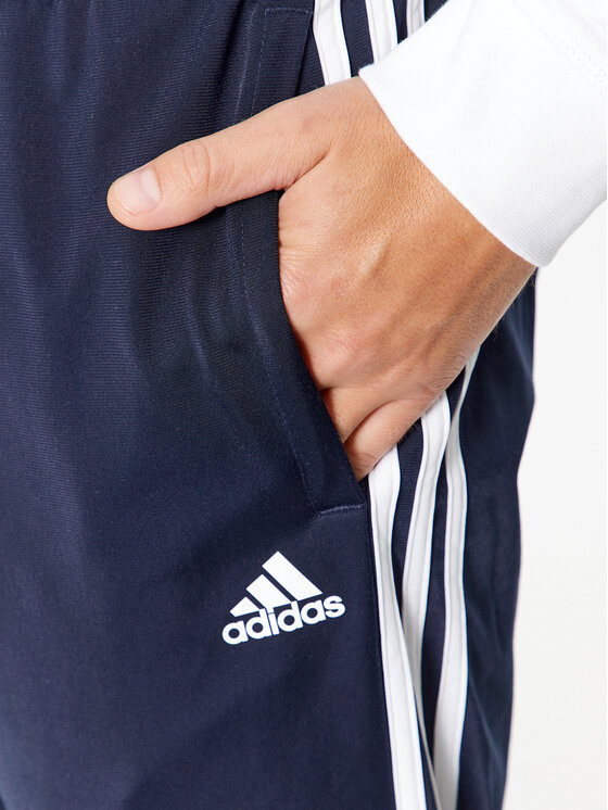 adidas adidas Spodnji del trenirke Essentials Warm-Up 3-Stripes H46106 Mornarsko modra Regular Fit