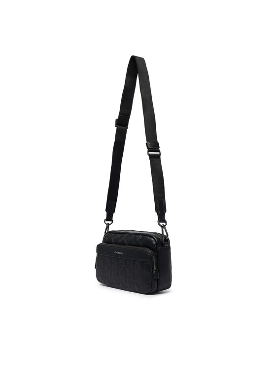 Calvin Klein Calvin Klein Torbica za okrog pasu Emblem Aop Deboss Camera Bag LV04D3563G Črna