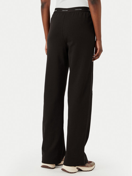 Calvin Klein Jeans Calvin Klein Jeans Pantaloni trening LV047G253G Maro închis Relaxed Fit