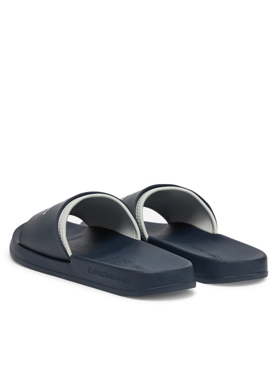 Calvin Klein Jeans Calvin Klein Jeans Klapki Slide Rubber Neoprene Monologo YM0YM00361 Granatowy