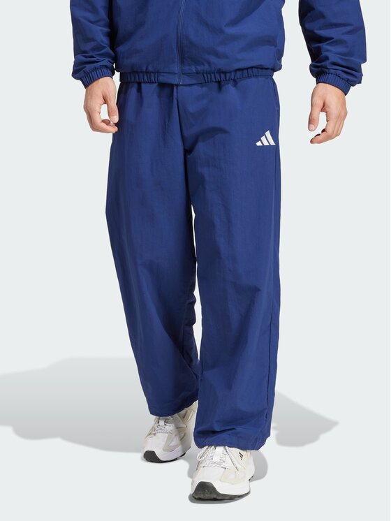 adidas adidas Spodnie materiałowe 151555 Niebieski Loose Fit