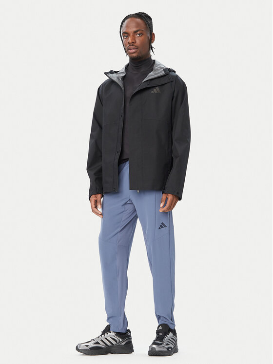 adidas adidas Giacca di transizione Essentials KS7695 Nero Loose Fit