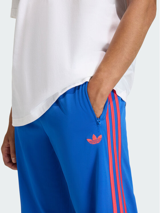 adidas adidas Spodnie dresowe FIREBIRD Błękitny Regular Fit