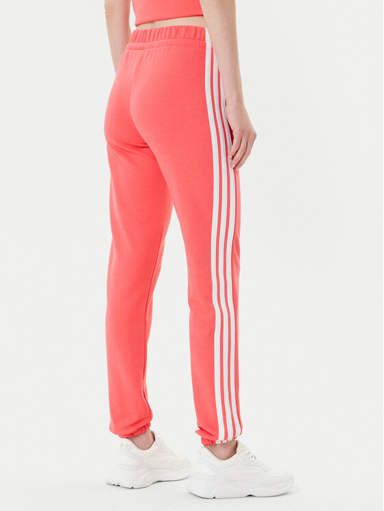 adidas adidas Spodnie dresowe Essentials 3-Stripes KE4387 Koralowy Regular Fit