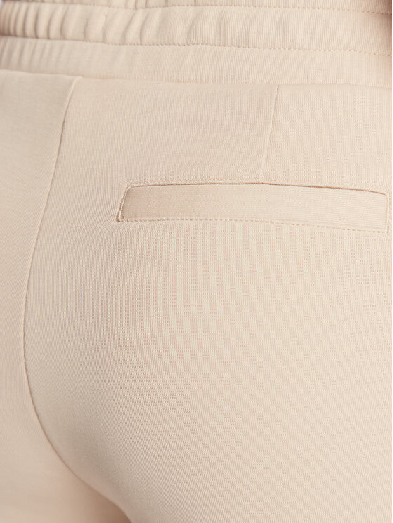 Calvin Klein Calvin Klein Spodnie dresowe Micro Logo Essential K20K204424 Beżowy Regular Fit