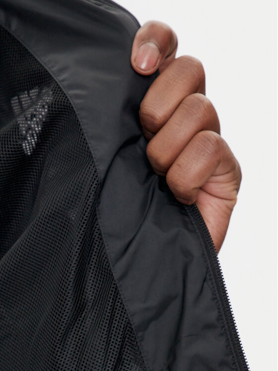 adidas adidas Giacca a vento Essentials 3-Stripes IB0381 Nero Regular Fit
