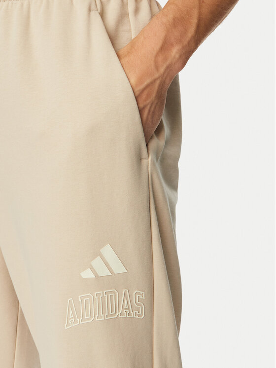 adidas adidas Dressipüksid Seasonal Essentials Collegiate French Terry Cuffed KF4265 Beež Regular Fit