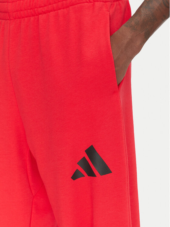 adidas adidas Sportinės kelnės Essentials JF3601 Raudona Loose Fit