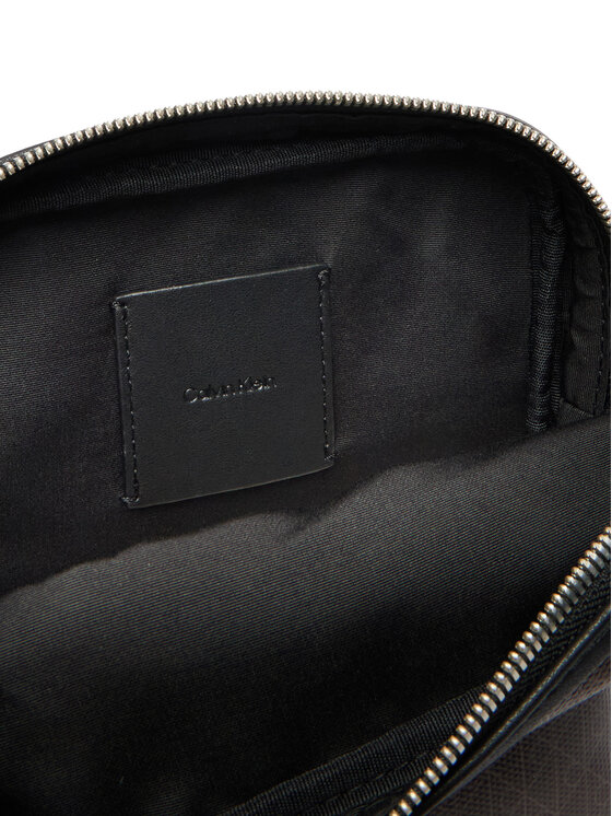 Calvin Klein Calvin Klein Somiņa Emblem Aop Coated Slim Reporter LV04D3334G Brūns