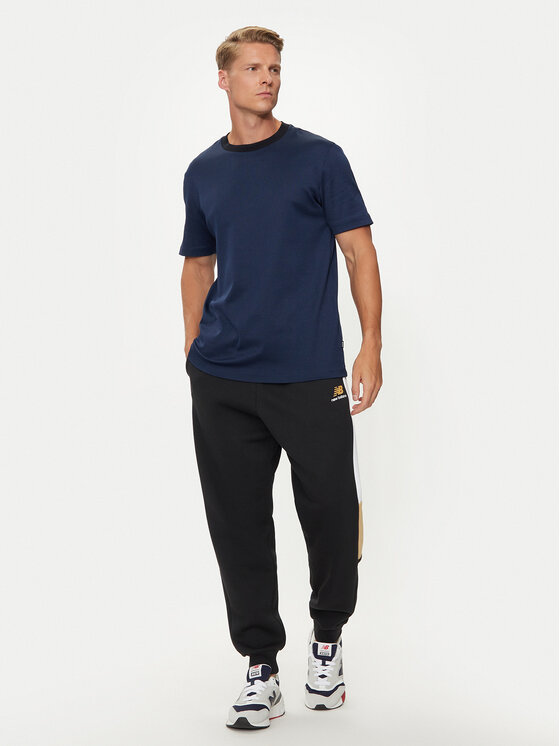 New Balance New Balance Pantaloni trening MP43522BK Negru Relaxed Fit