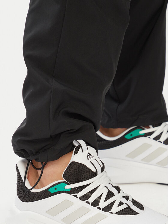 adidas adidas Παντελόνι φόρμας adicolor Teamgeist KD5863 Μαύρο Loose Fit