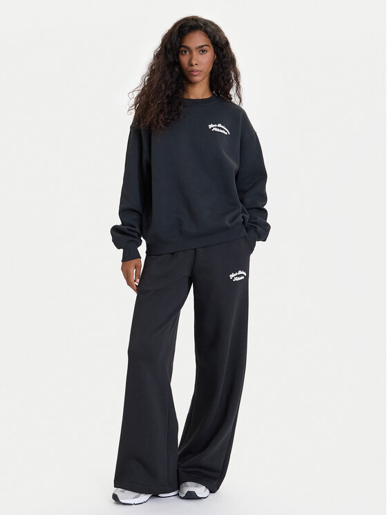 New Balance New Balance Pantaloni trening WP53902 Negru Relaxed Fit