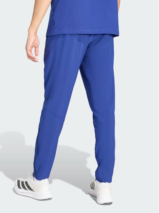 adidas adidas Spodnie materiałowe Włochy Tiro Błękitny Regular Fit