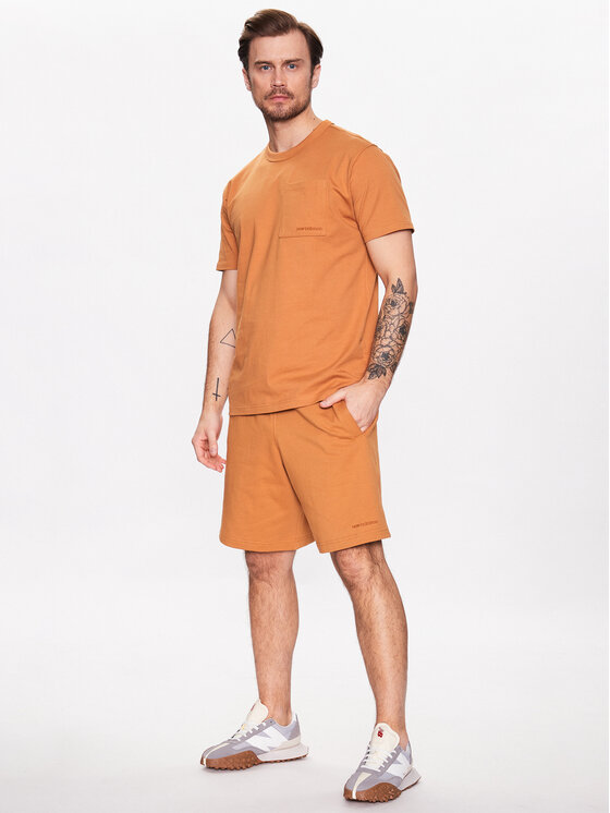 New Balance New Balance Majica Athletics Nature State MT23567 Oranžna Relaxed Fit