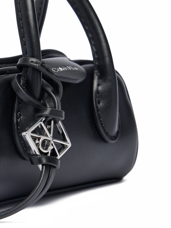 Calvin Klein Calvin Klein Puzdro na kľúče Emblem Trio Mini Bag Charm LV04F1315G Čierna