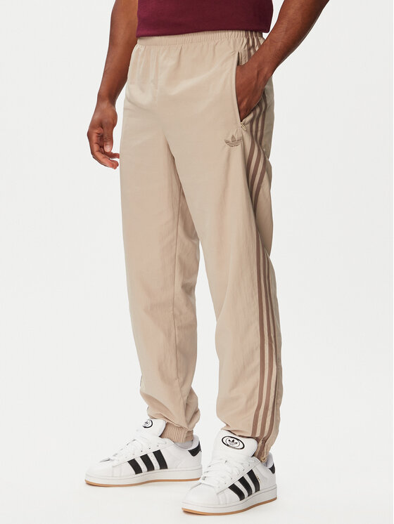 adidas Pantaloni trening Firebird KS7503 Bej Regular Fit
