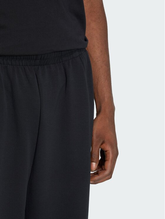 adidas adidas Spodnie materiałowe 159356 Czarny Loose Fit