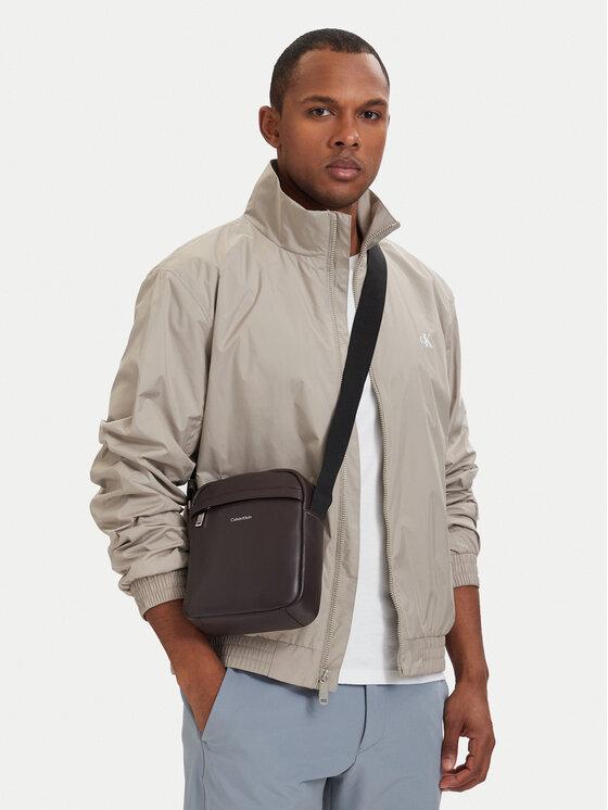 Calvin Klein Geantă crossover Raised Reporter LV04D3160G Maro