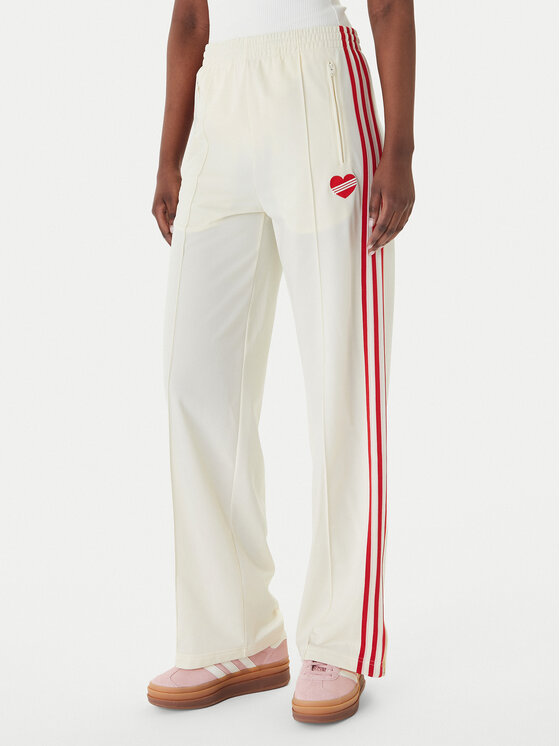 adidas adidas Teplákové kalhoty Firebird KQ8056 Béžová Loose Fit