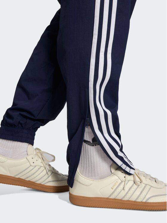 adidas adidas Spodnie dresowe FIREBIRD WOVEN Błękitny Regular Fit