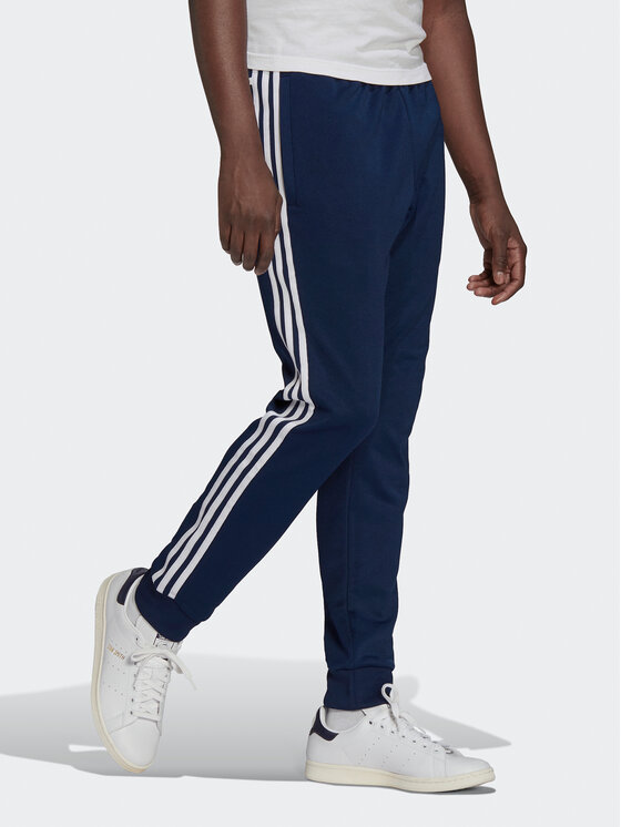 adidas adidas Sporta bikses ADICOLOR CLASSICS PRIMEBLUE SST Tracksuit Bottom HK7353 Zils Slim Fit