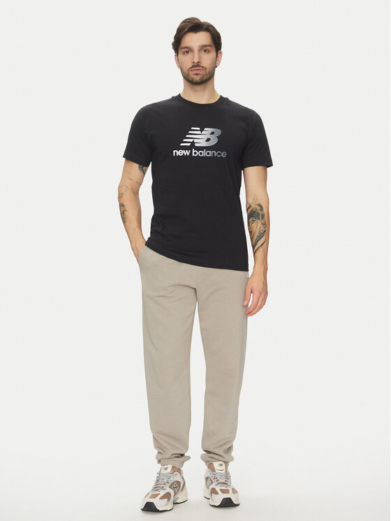 New Balance New Balance Spodnie dresowe Essentials MP41519 Beżowy Relaxed Fit